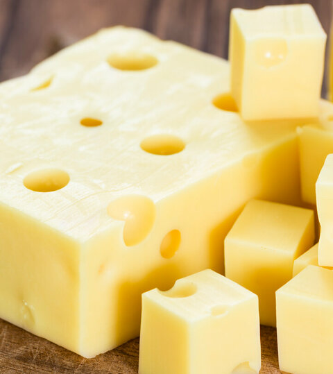 Emmental cheese on a vesper board